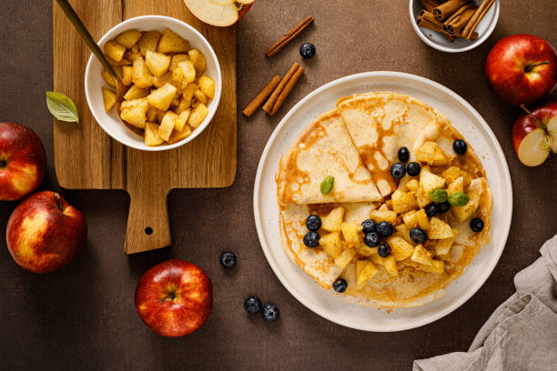 istock Crepes with caramelized cinnamon apples, top view 1444353829