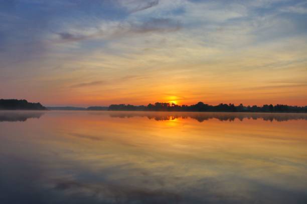 istock Breathtaking golden sunset at the beach. 1444355143