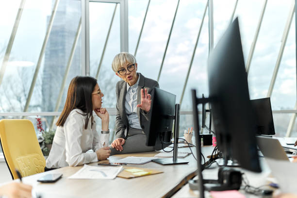 istock Female entrepreneurs working on PC in the office. 1444355599