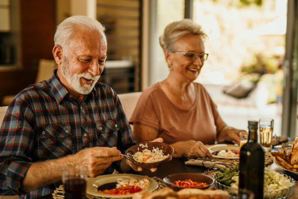 istock Senior couple on a sunday lunch 1444356785