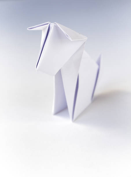 istock Paper dog origami isolated on a white background 1444359968
