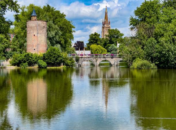 istock Minnewater park at Bruges with scenic waterscape and greenery 1444360702
