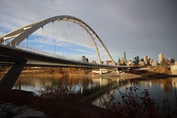 istock Low angle view of a white bridge constructed above the water 1444361219