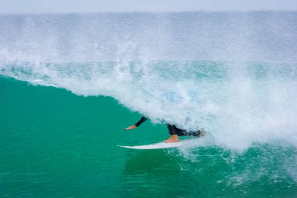 istock Surfer under a foamy wave in Jeffreys Bay, South Africa 1444361245