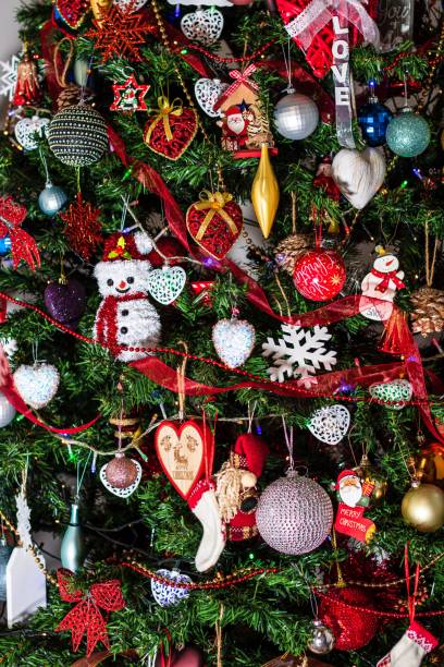 istock Christmas ornaments and decorations hanging in the Christmas tree 1444363698