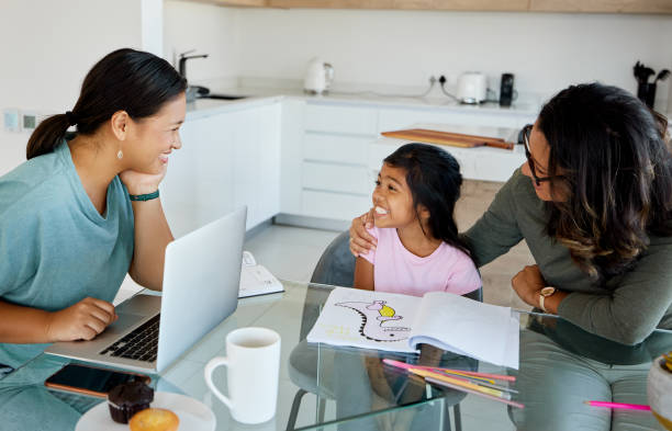 istock Education, learning and working with a girl or student studying while her mother does remote work from home. Homeschool, entrepreneur and tutor with a child and parent at work in their home 1444368957