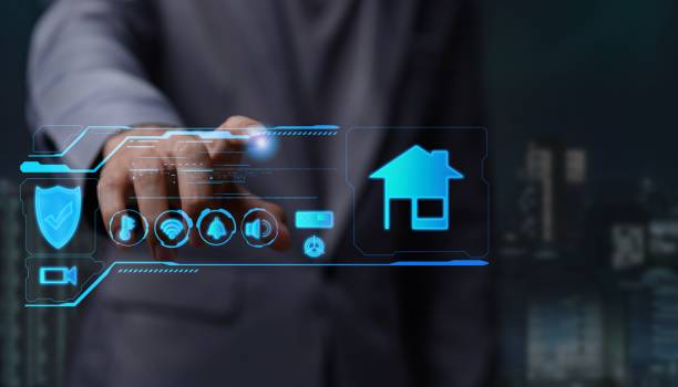 istock Businessman clicking on a smart home icon - Automated Control metaverse system concept 1444375272