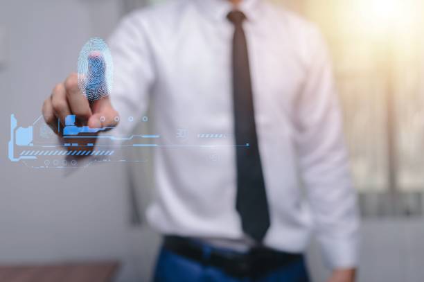 istock Businessman scanning a fingerprint - security system concept 1444375402