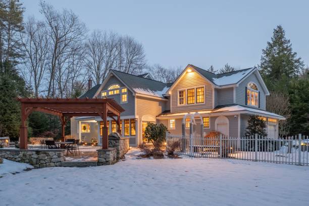 istock Beautiful modern house surrounded by nature in winter 1444379826