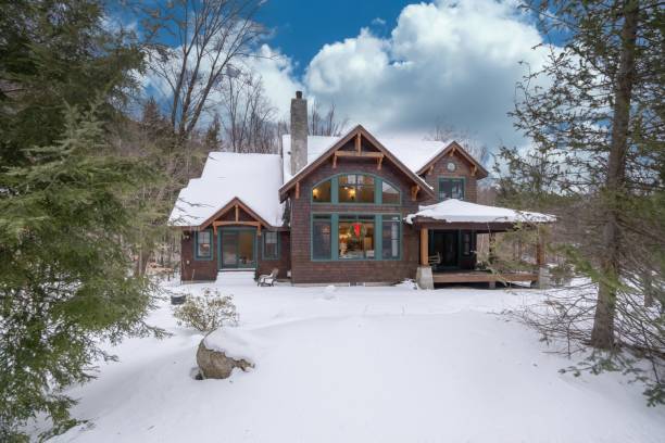 istock Brick suburban house covered with snow during winter 1444380111