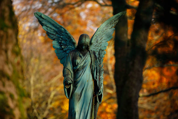 istock Antique Angel statue in a Cemetery 1444382496