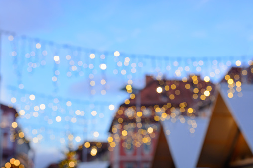 Blurred background with evening city view and lights in horizontal format