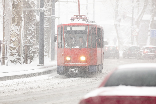 Tram public transportation in winter conditions.