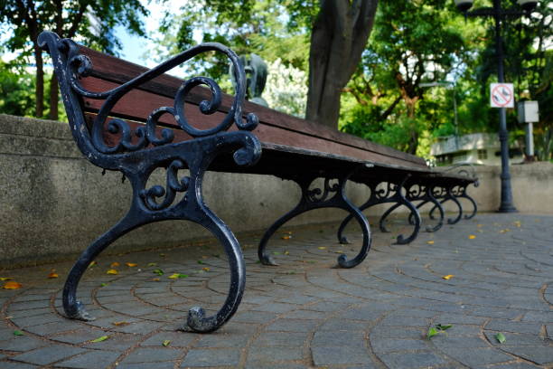 istock Vintage Long Bench in the Park. 1444388089