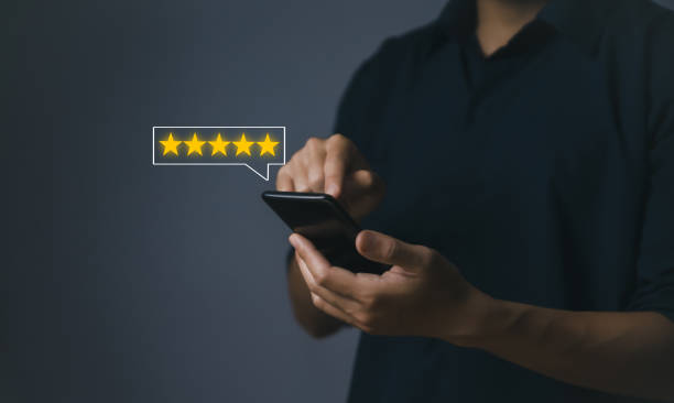 istock Use a smartphone. Customer reviews give five-star ratings. 1444388730
