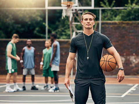 Coach, man and basketball portrait on court training for match, game or competition. Exercise, sports and mindset, vision and motivation of trainer in Canada for workout fitness, wellness and health.