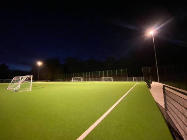 istock Empty soccer field in floodlights 1444398108