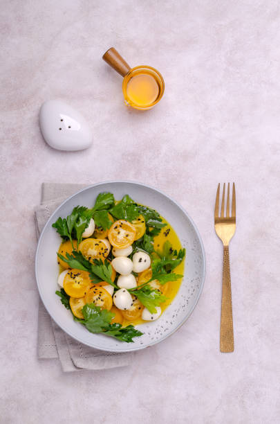 istock Yellow tomatoes, mozzarella and parsley 1444403493