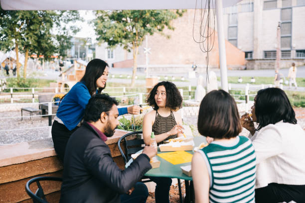 istock Business colleagues gathering for nice outdoors lunch 1444407406