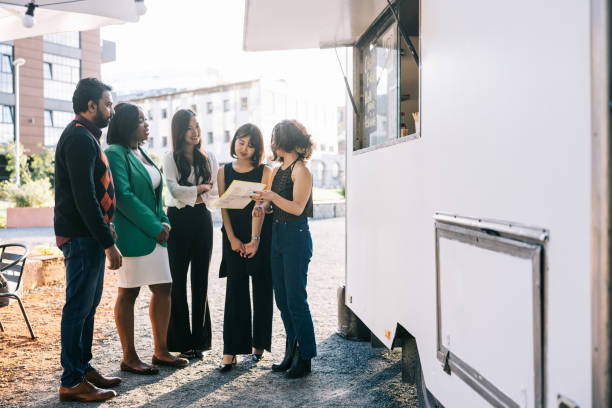 istock Business colleagues gathering for nice outdoors lunch 1444407443