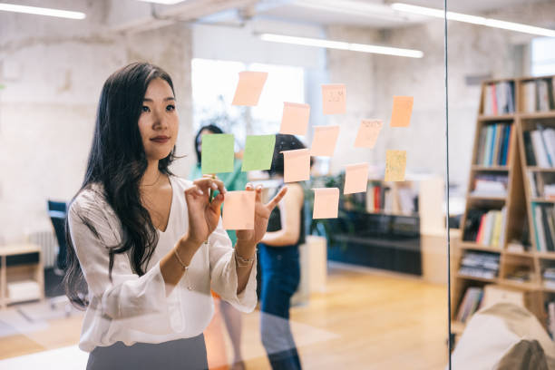 istock Business people creating mind map full of fresh ideas. 1444407544