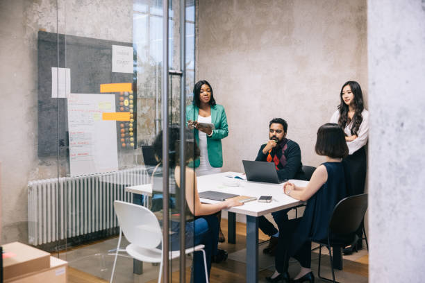 istock Group of Architects working hard for deadline 1444407571