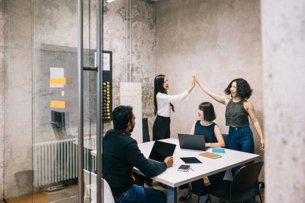 istock Marketing team congratulating each other 1444407583