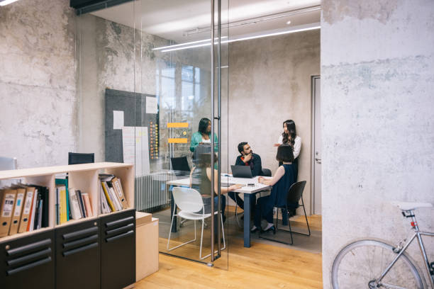 istock Group of Architects working hard for deadline 1444407595