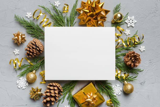 istock Flat lay Christmas composition. square Paper blank, pine tree branches, christmas decorations on Colored background. Top view, copy space for text 1444407983