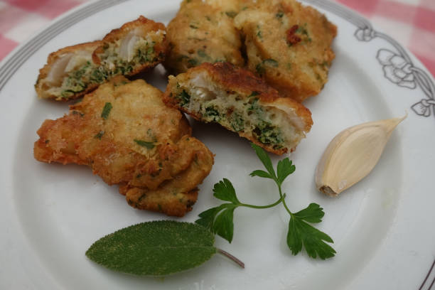 istock Cod fritters cooked with liquid batter seasoned with parsley garlic and sage 1444410362