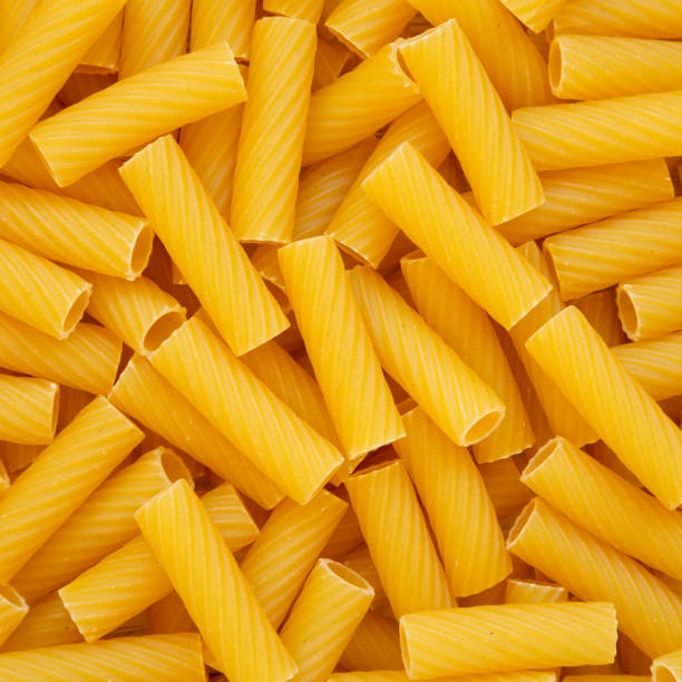 istock Dry Rigatoni Pasta, top view. Flat lay, overhead, from above. 1444411364