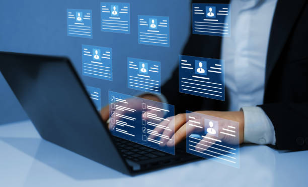istock Employees must complete the online survey form, answer the test questions.Marked checklist on a clipboard. Human resources and management concept 1444413916