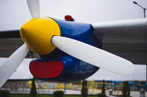 Close up shot of a colorful vintage airplane propeller.