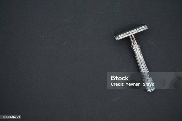 Tshaped Razor On A Black Background Top View Place For Text Stock Photo - Download Image Now