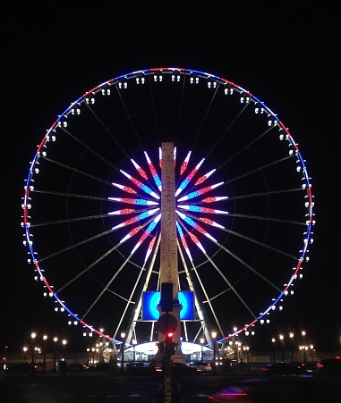 Amusement Park Ride at Night, Ferris Wheel Lit Up By Lights, Obelisk Setting the Foreground