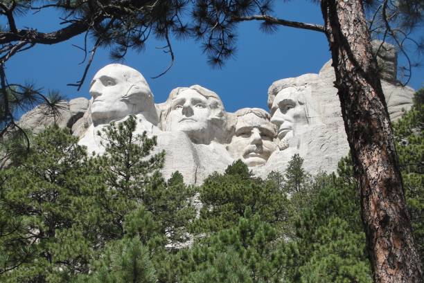 Scenic View of Mount Rushmore Portrait of Sculpture, Mount Rushmore Seen in Scenic View theodore roosevelt us president stock pictures, royalty-free photos & images