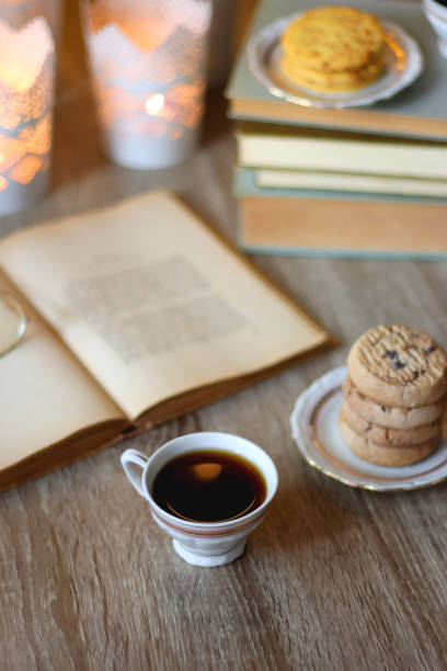 istock Cookies, Tea, Books and Candles 1444440638