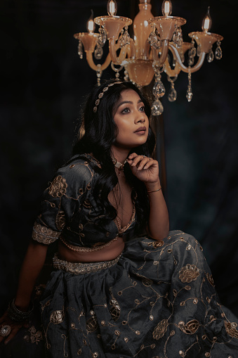 Indian Model Posing With Deep Neck Traditional Lehenga In Studio,Model Portrait Stock Photo