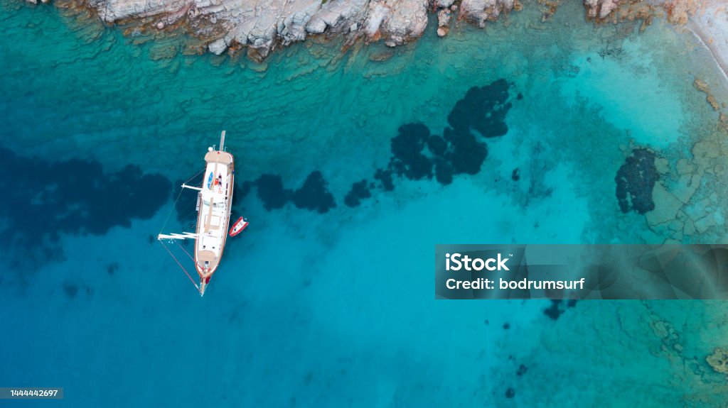 Aerial view of Sailing Gulet. Aerial view of Sailing Gulet. A gulet is a wooden classic yacht built usually in Bodrum or Marmaris from the southwestern coast of Turkey. Türkiye - Country Stock Photo