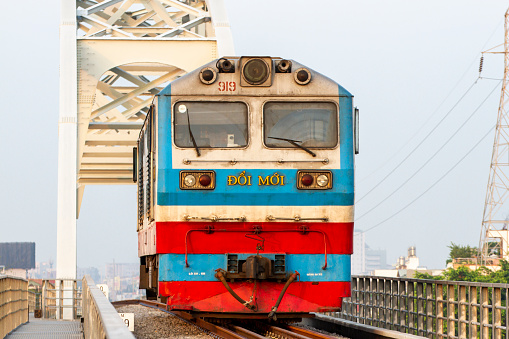 Ho Chi Minh City, Vietnam - January 1, 2022 : Vietnam Train Diesel Locomotive Over Binh Loi Railway Bridge.