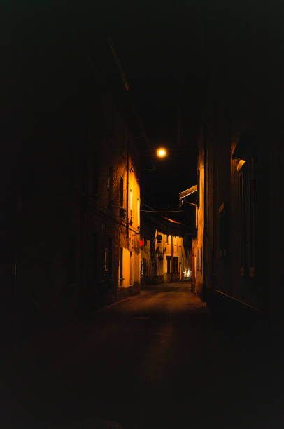 istock ancient alley with houses in the night 1444453441