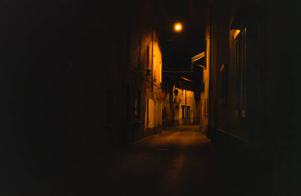 ancient alley with houses in the night