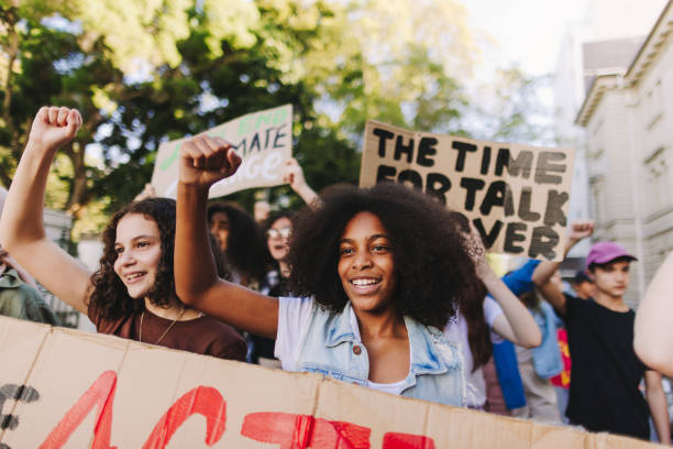 istock Multiethnic young people taking action against climate change 1444454675