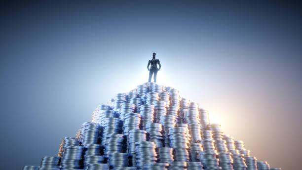istock silhouette business man sucess standing on coins 1444454711