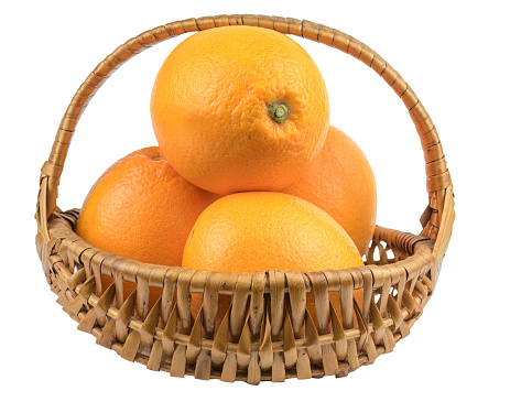 Nice wicker basket full of fresh and varied fruit