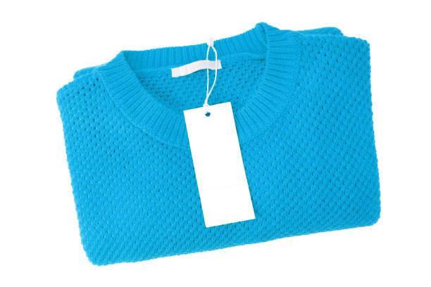 istock White blank rectangular clothing tag on turquoise knitted sweater isolated on white background 1444455979