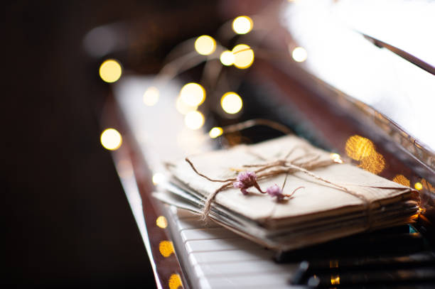 Piano keys with glow lights and old lettes