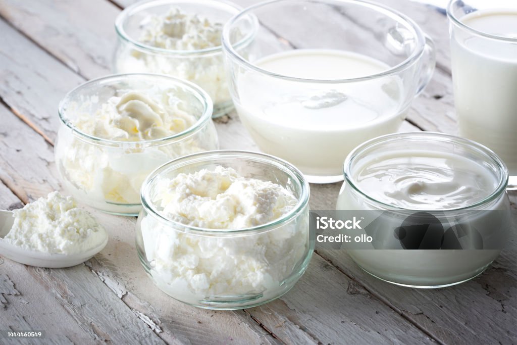 Dairy products - milk, cream, yoghurt, cottage cheese and curd Backgrounds Stock Photo