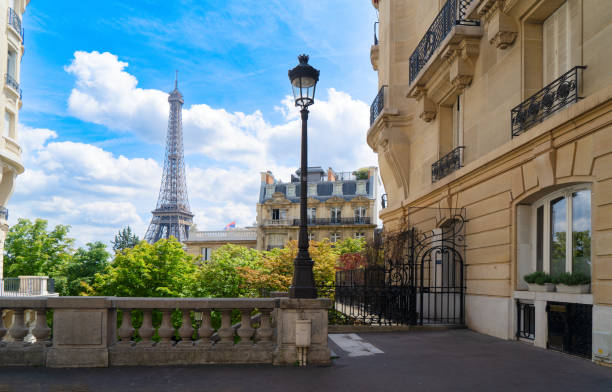 istock eiffel tour and Paris street 1444462517