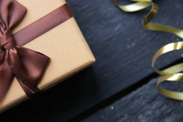 istock Gift with ribbon On vintage background. 1444464418
